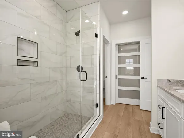 a front view of a house with a yard table and chairs
