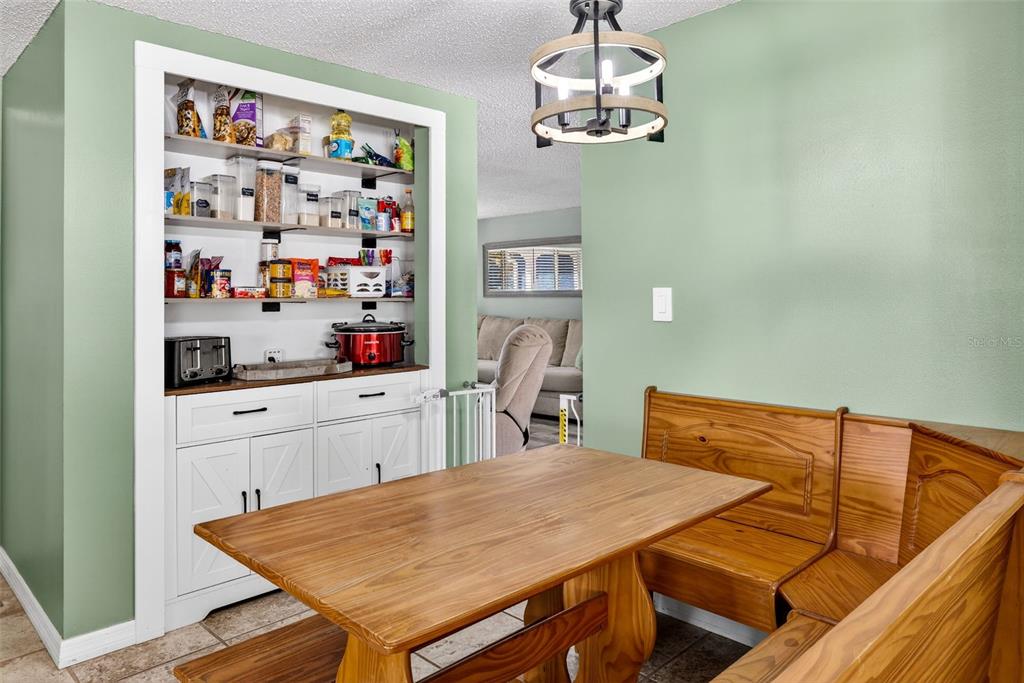 7325 Neva Lane Port Richey, FL 34668 - Photo 12 of 36 a view of a dining room with furniture