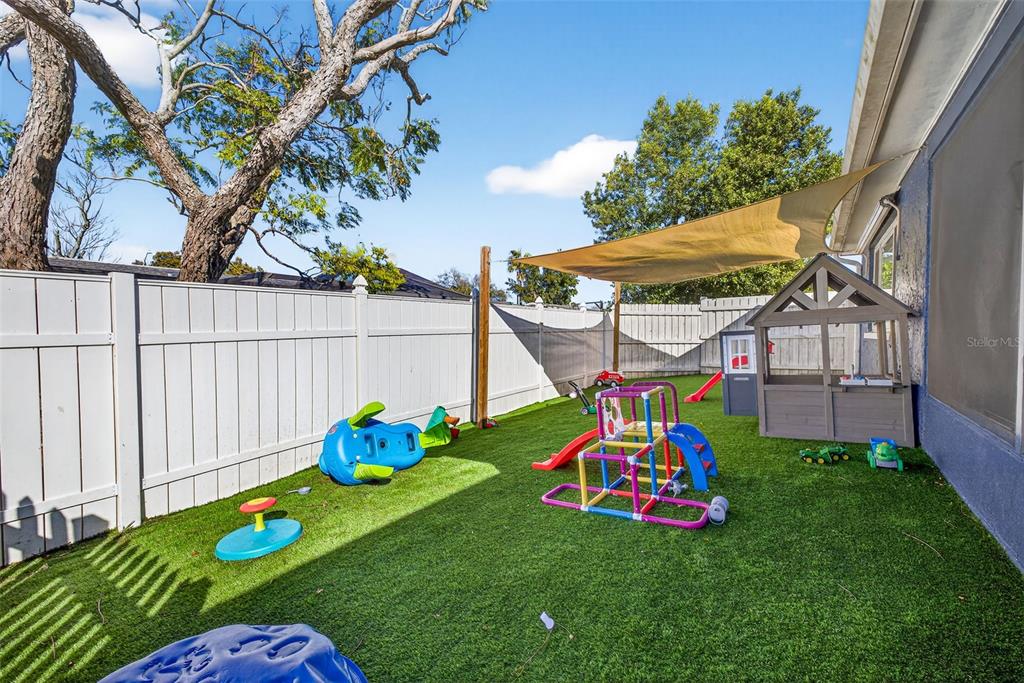 7325 Neva Lane Port Richey, FL 34668 - Photo 30 of 36 a childrens park with lots of swings and slides