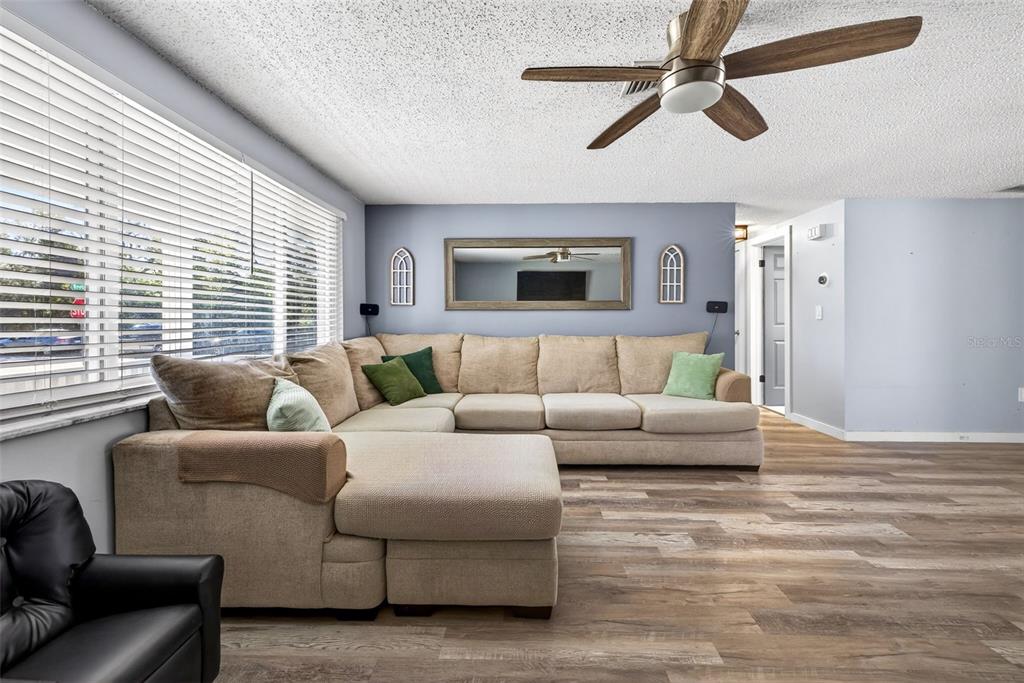 7325 Neva Lane Port Richey, FL 34668 - Photo 33 of 36 a living room with furniture and a large window