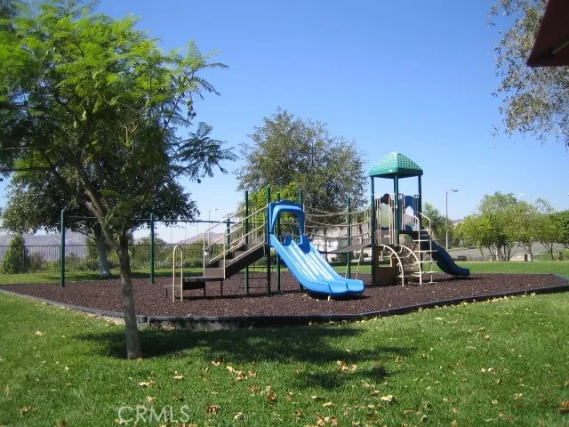 a view of a park with slide