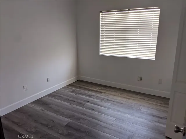 a view of a room that has a window in it
