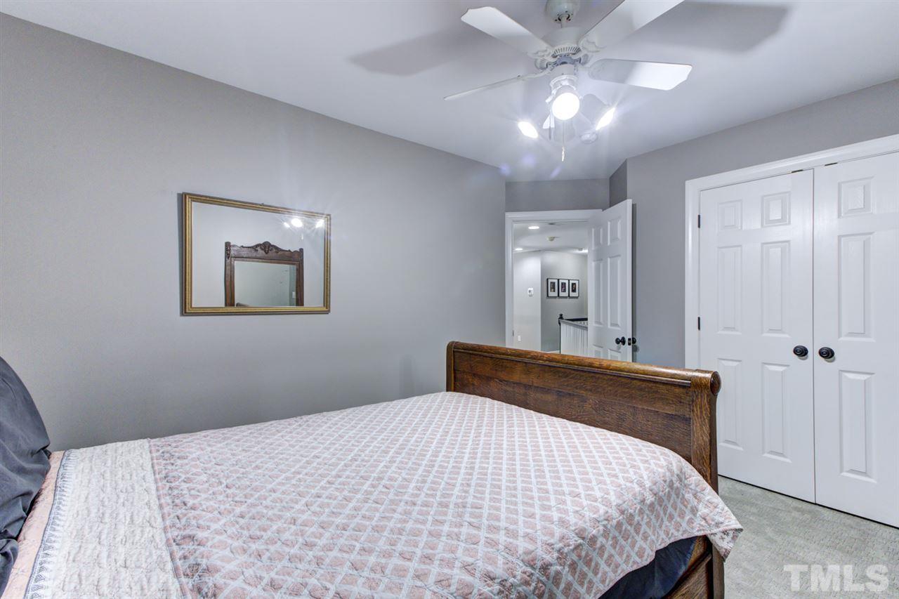 5329 Indigo Moon Way Raleigh, NC 27613 - Photo 22 of 30 Sweet dreams! Tots to teen will love this spacious room with plush carpeting!