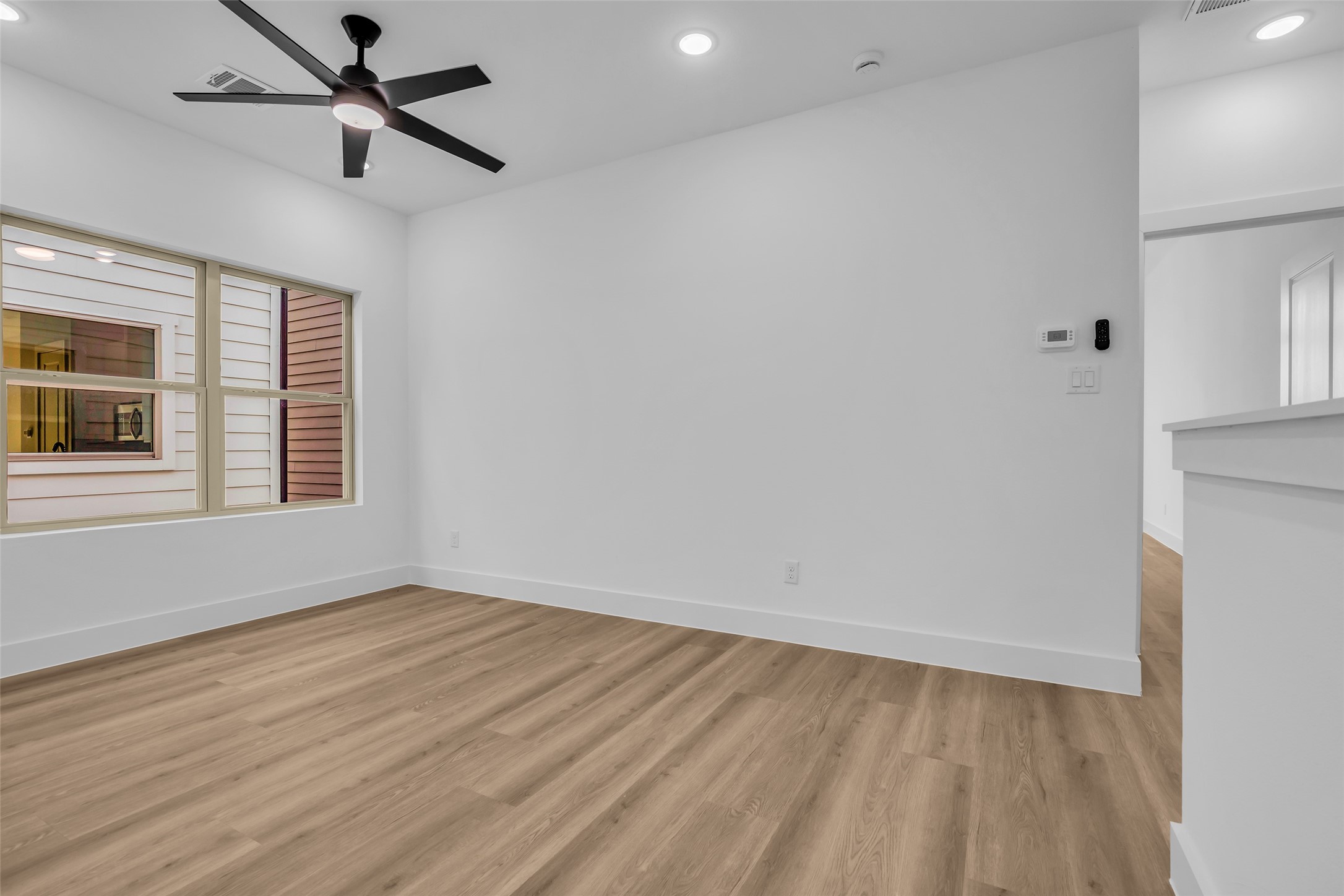 1506 Griffin Street Houston, TX 77009 - Photo 23 of 38 Immediately to the right is the amazing Primary Retreat, we will come back to that, follow us down the hall to the spacious secondary bedrooms.