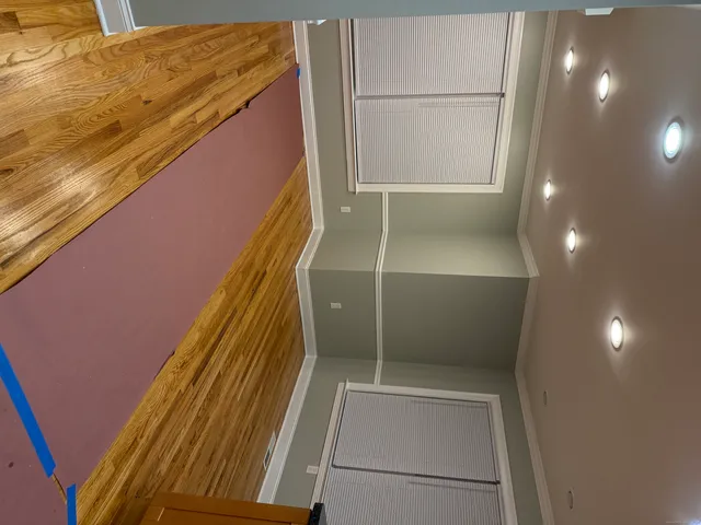 a view of a house with a street