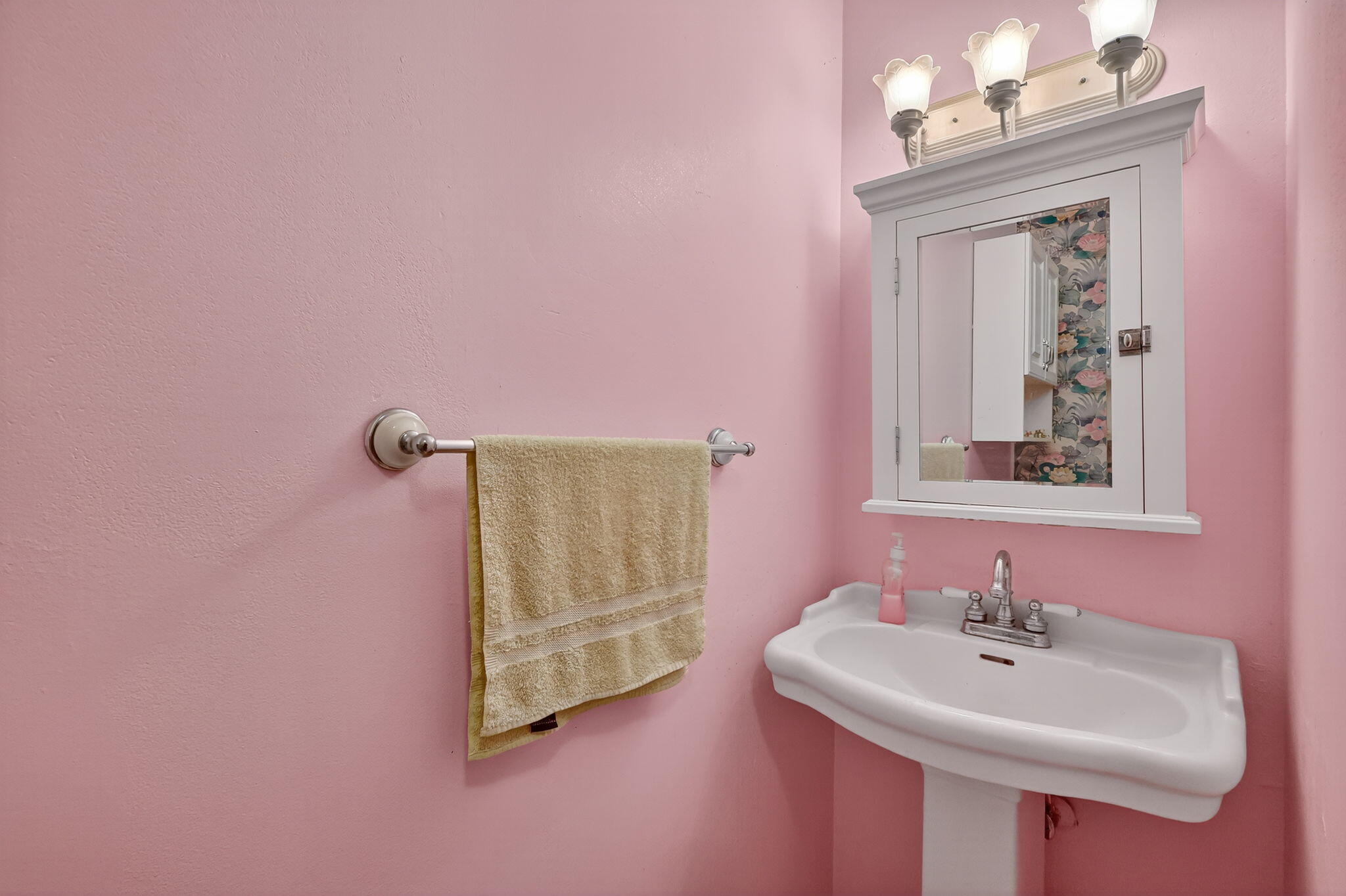 2929 Southeast Ocean Boulevard, Unit J10 Stuart, FL 34996 - Photo 16 of 29 a bathroom with a sink a mirror and a window