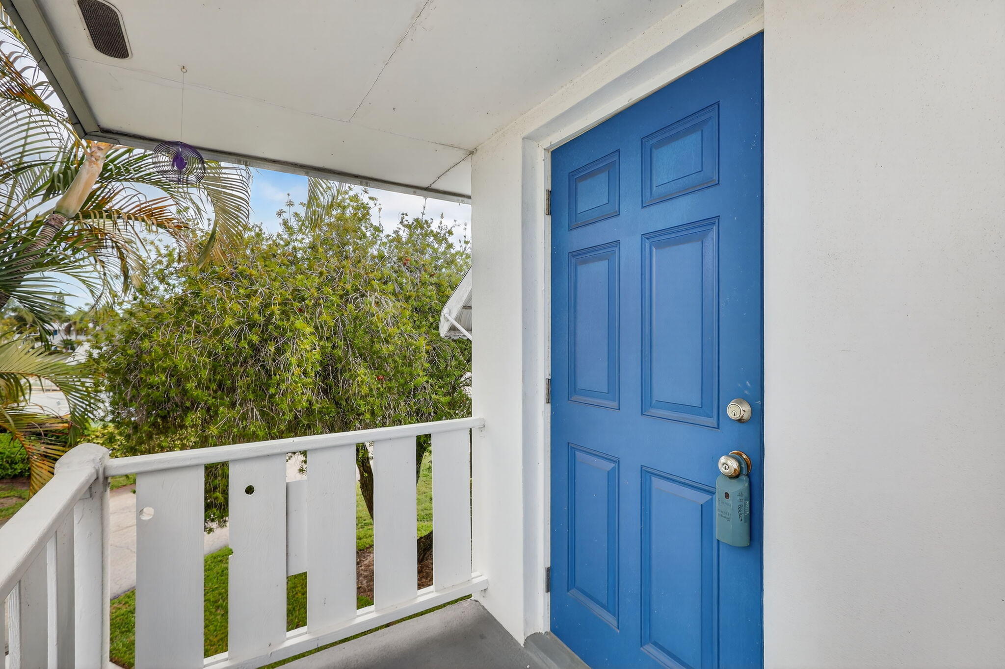 2929 Southeast Ocean Boulevard, Unit J10 Stuart, FL 34996 - Photo 3 of 29 a view of a wooden door