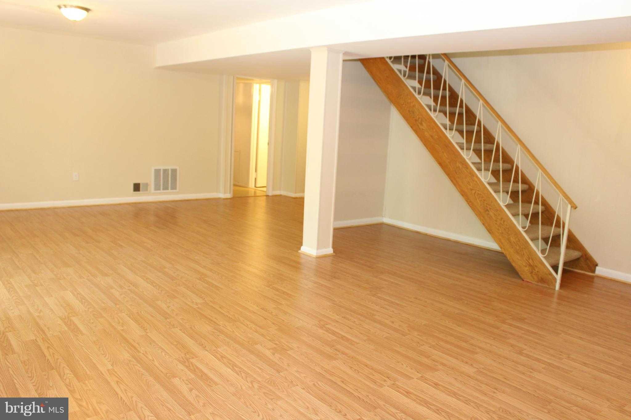 6218 Tyner Street Springfield, VA 22152 - Photo 20 of 30 Open rec room perfect for tv, parties, and gaming