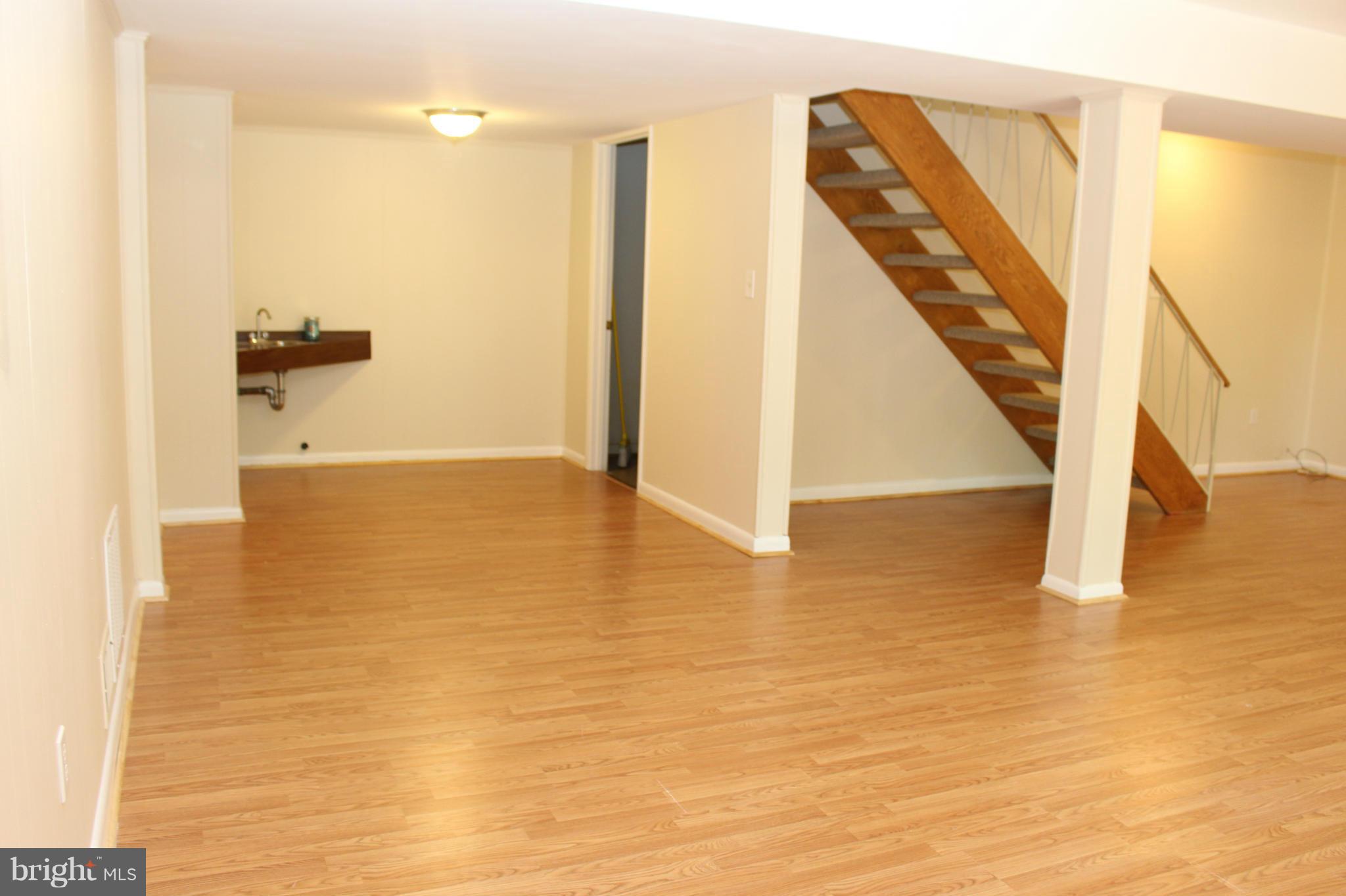 6218 Tyner Street Springfield, VA 22152 - Photo 21 of 30 Small wet bar located off rec room