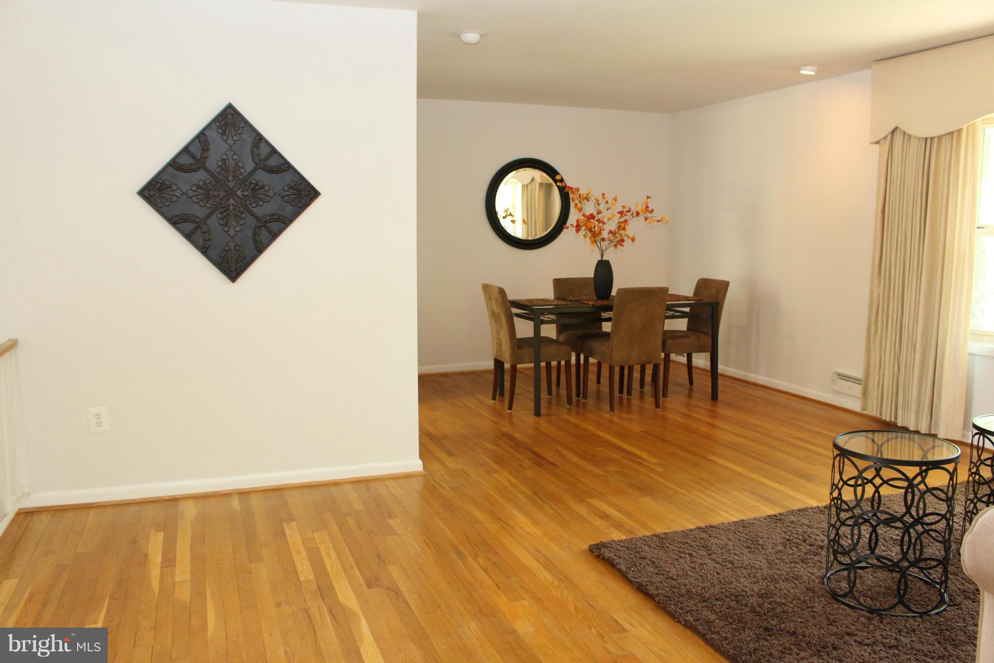 6218 Tyner Street Springfield, VA 22152 - Photo 30 of 30 Open floor plan for living and dining room