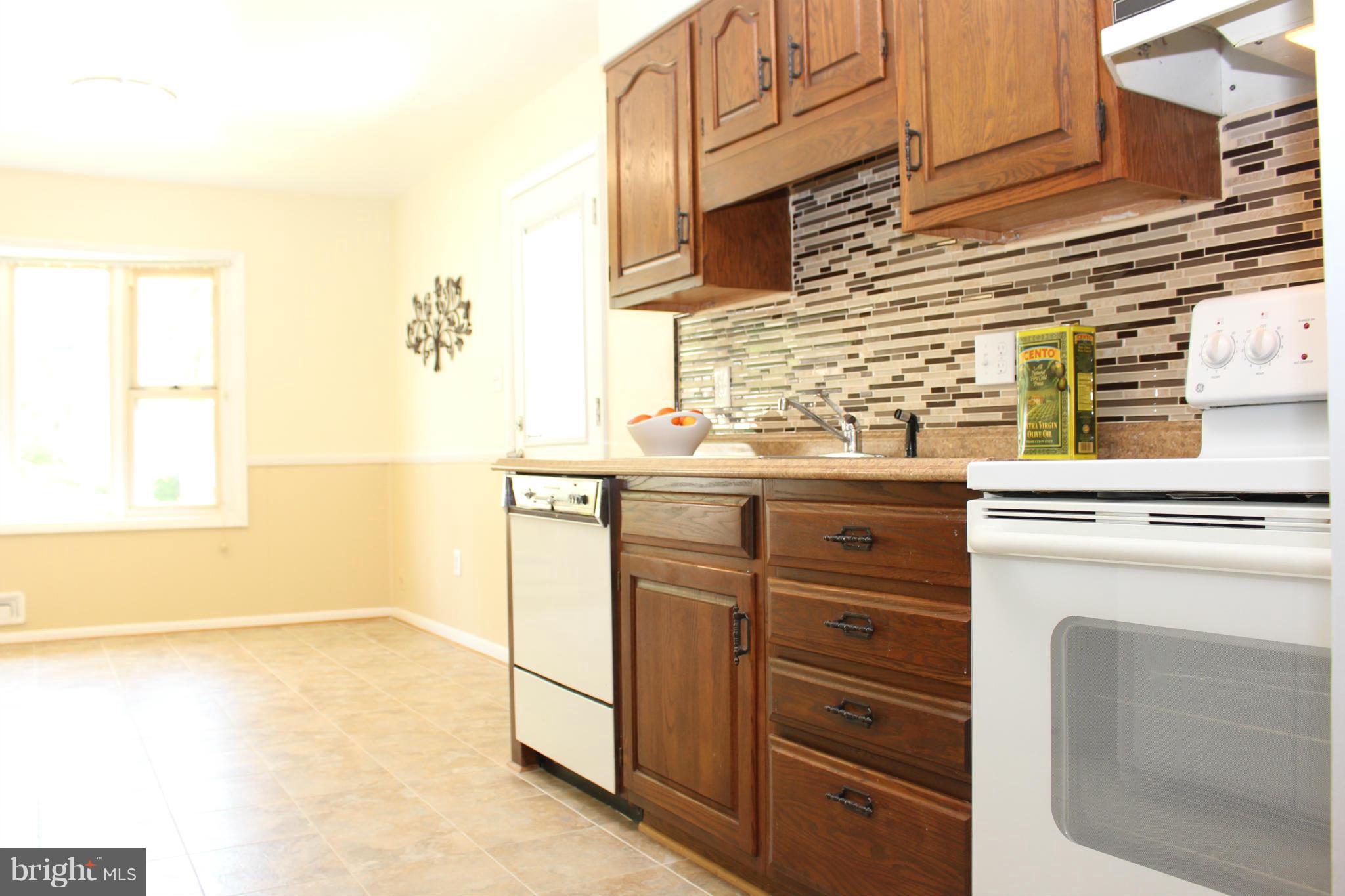 Lovely updated backsplash in Kitchen