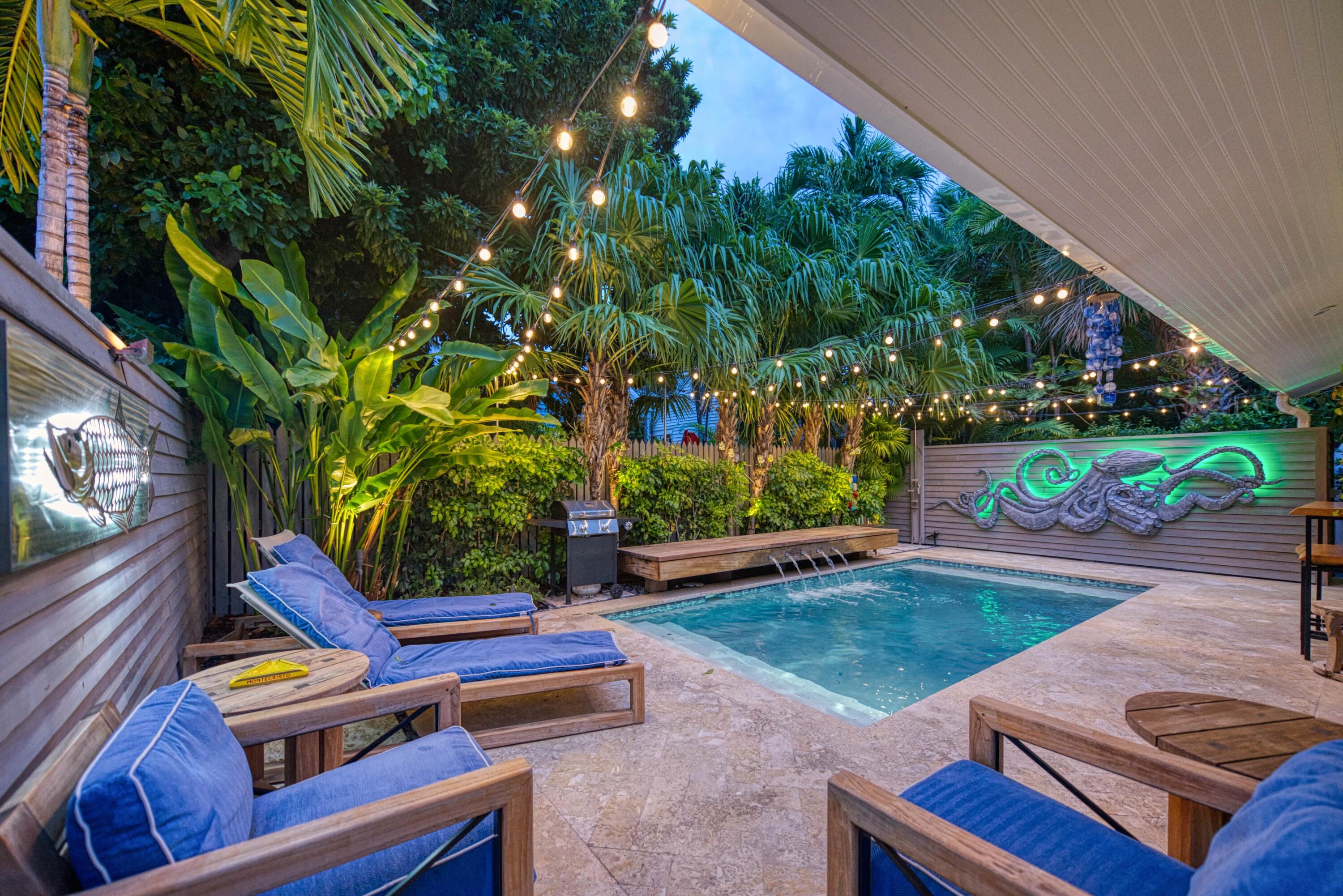 805 Shavers Lane Key West, FL 33040 - Photo 18 of 32 a view of backyard with swimming pool and outdoor seating
