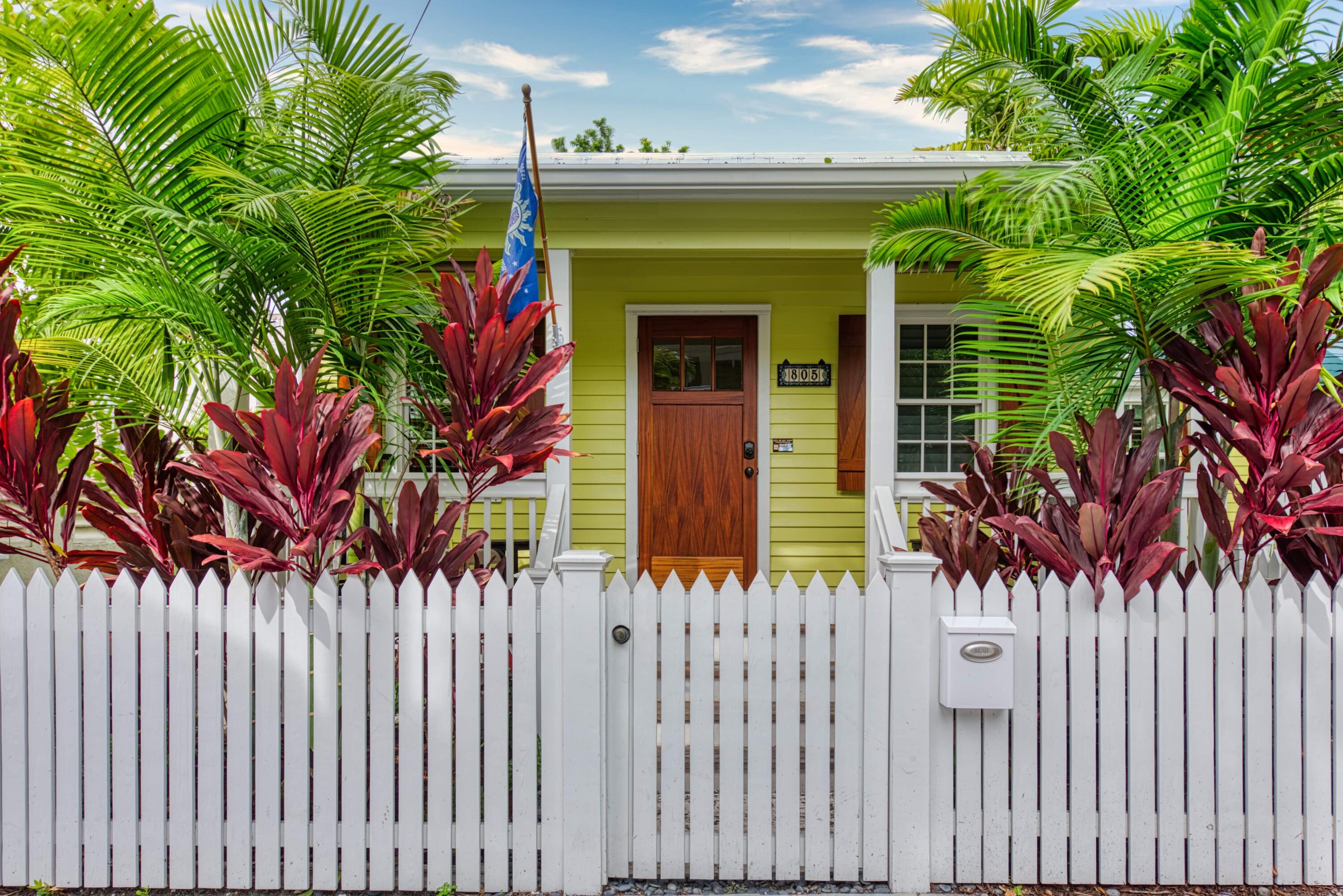 805 Shavers Lane Key West, FL 33040 - Photo 2 of 32 a front view of a house with a tree