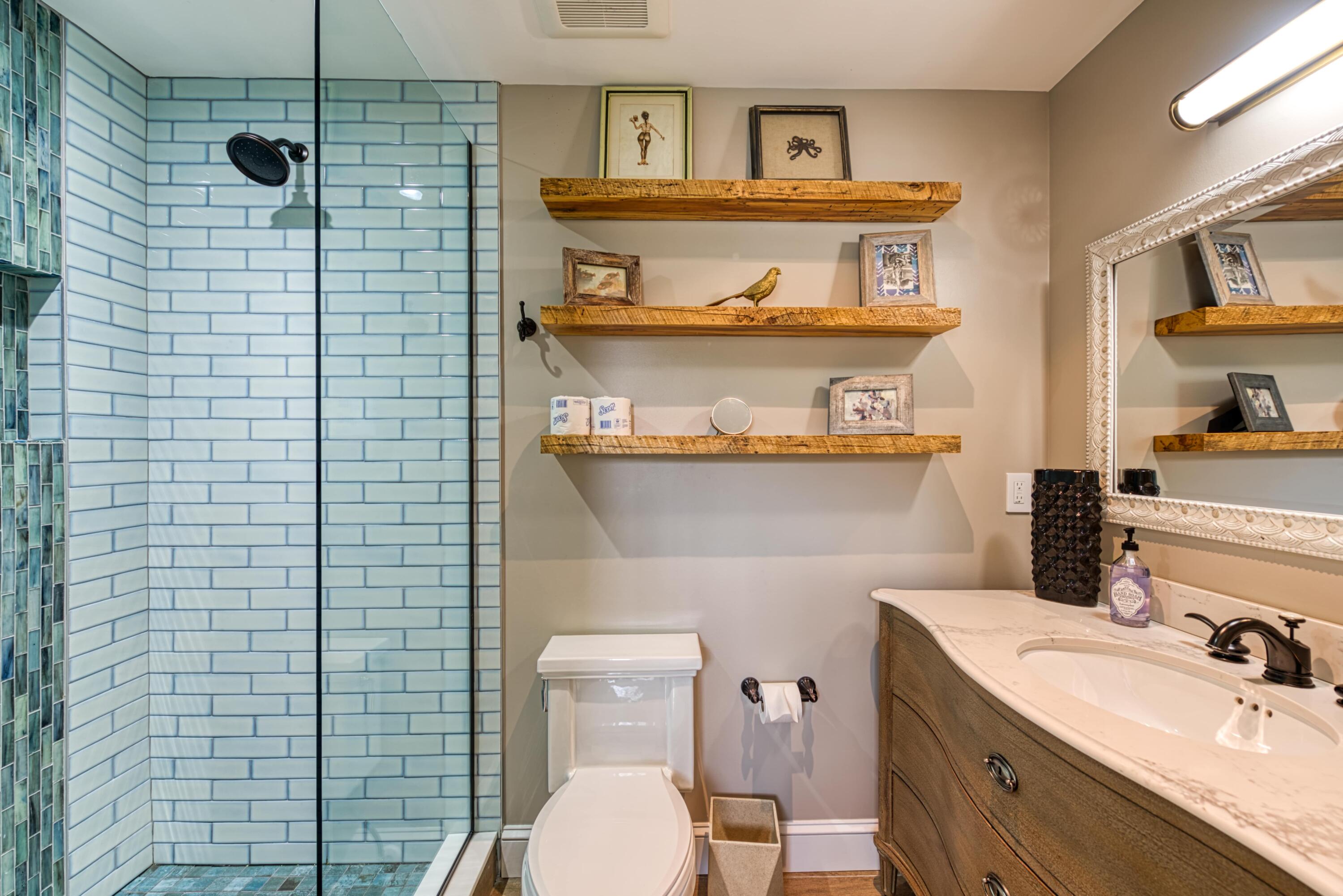 805 Shavers Lane Key West, FL 33040 - Photo 27 of 32 a bathroom with a sink a toilet and a mirror