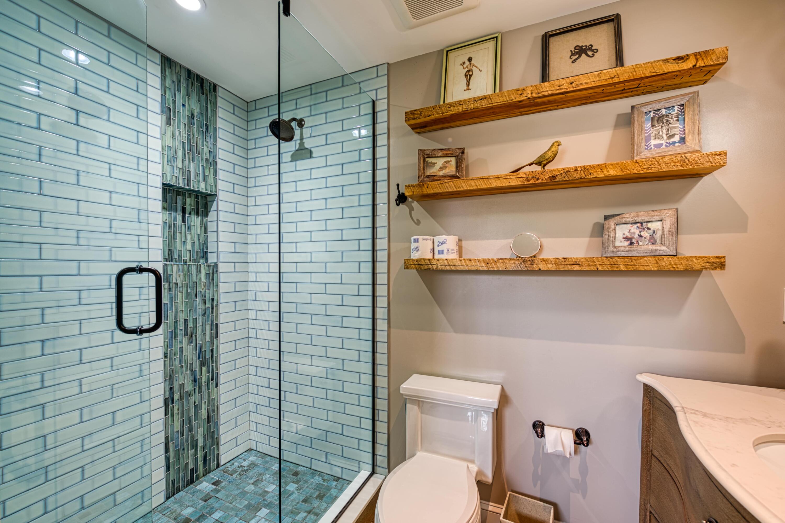 805 Shavers Lane Key West, FL 33040 - Photo 28 of 32 a bathroom with a shower a mirror and a toilet