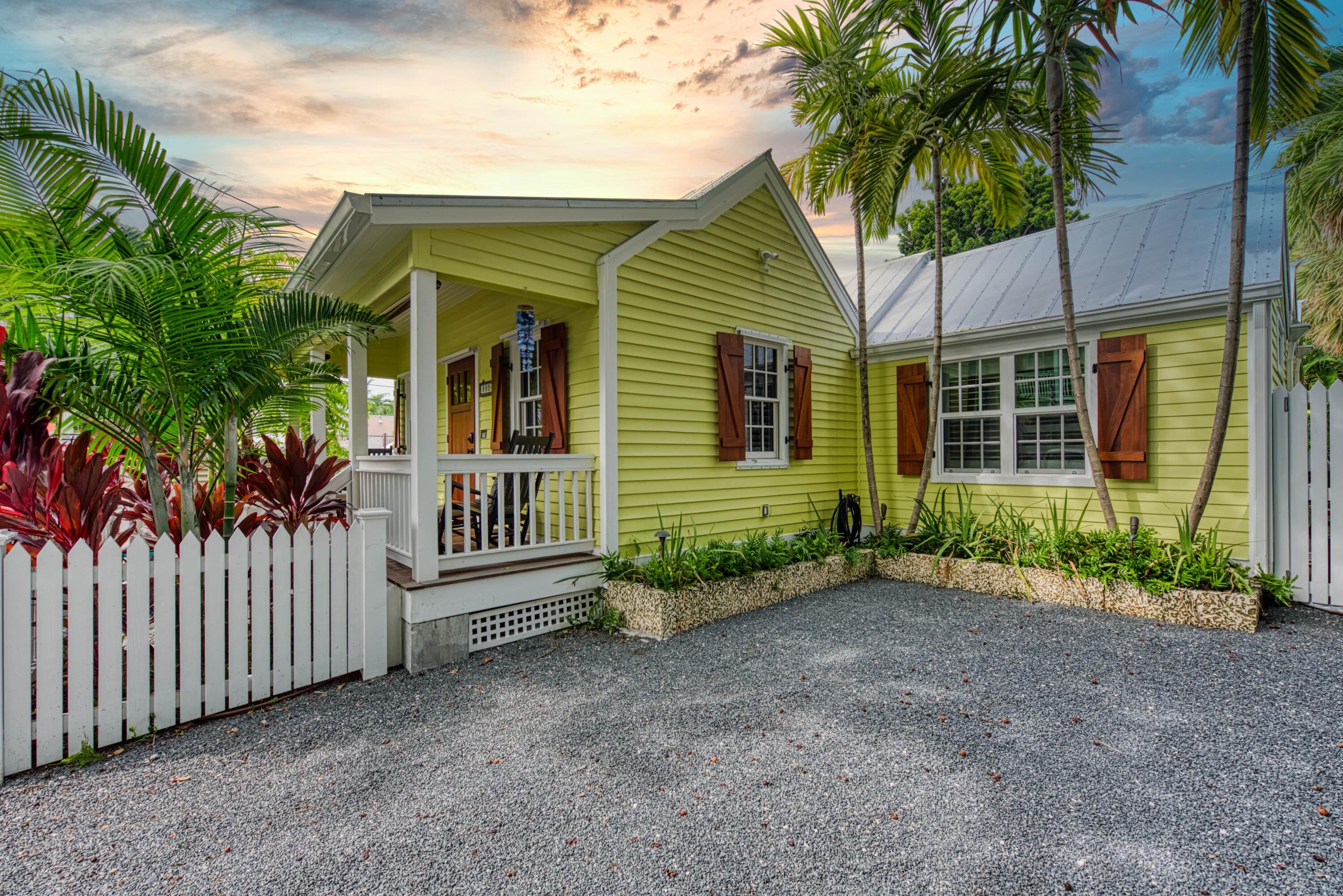 805 Shavers Lane Key West, FL 33040 - Photo 3 of 32 a view of a house with a yard and potted plants
