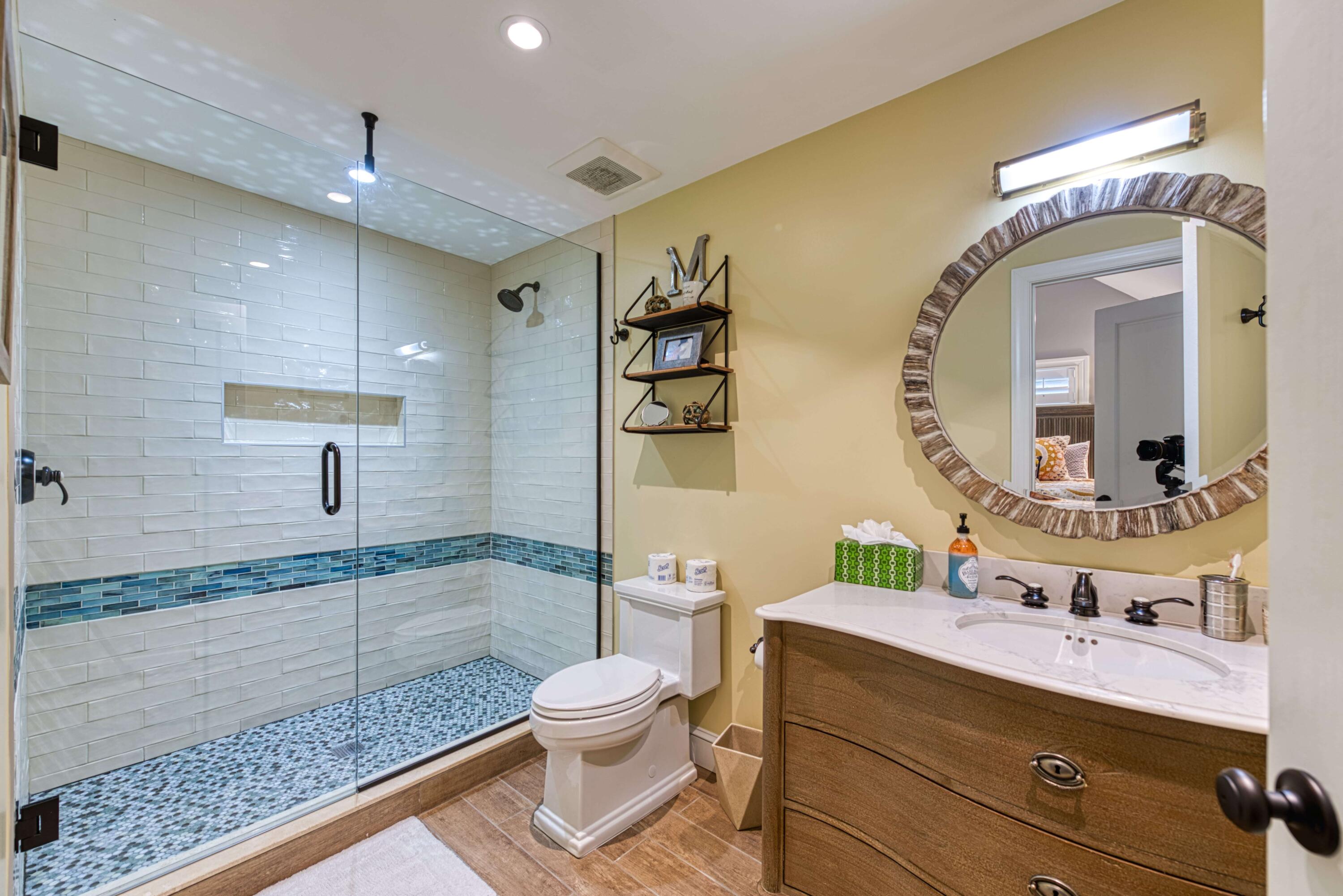 805 Shavers Lane Key West, FL 33040 - Photo 31 of 32 a bathroom with a toilet a sink and mirror