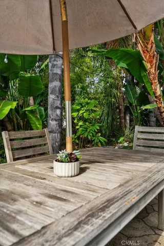 a view of a yard with furniture