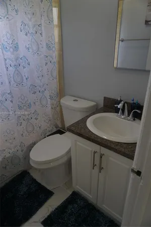 a storage room with washer and dryer