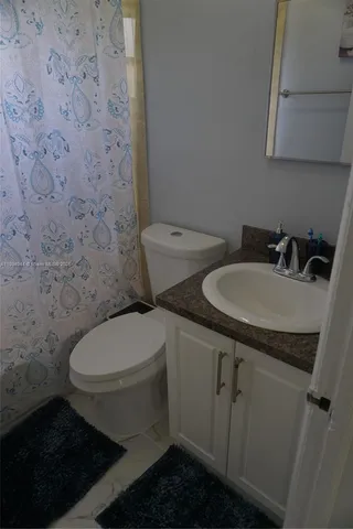 a dining room with furniture