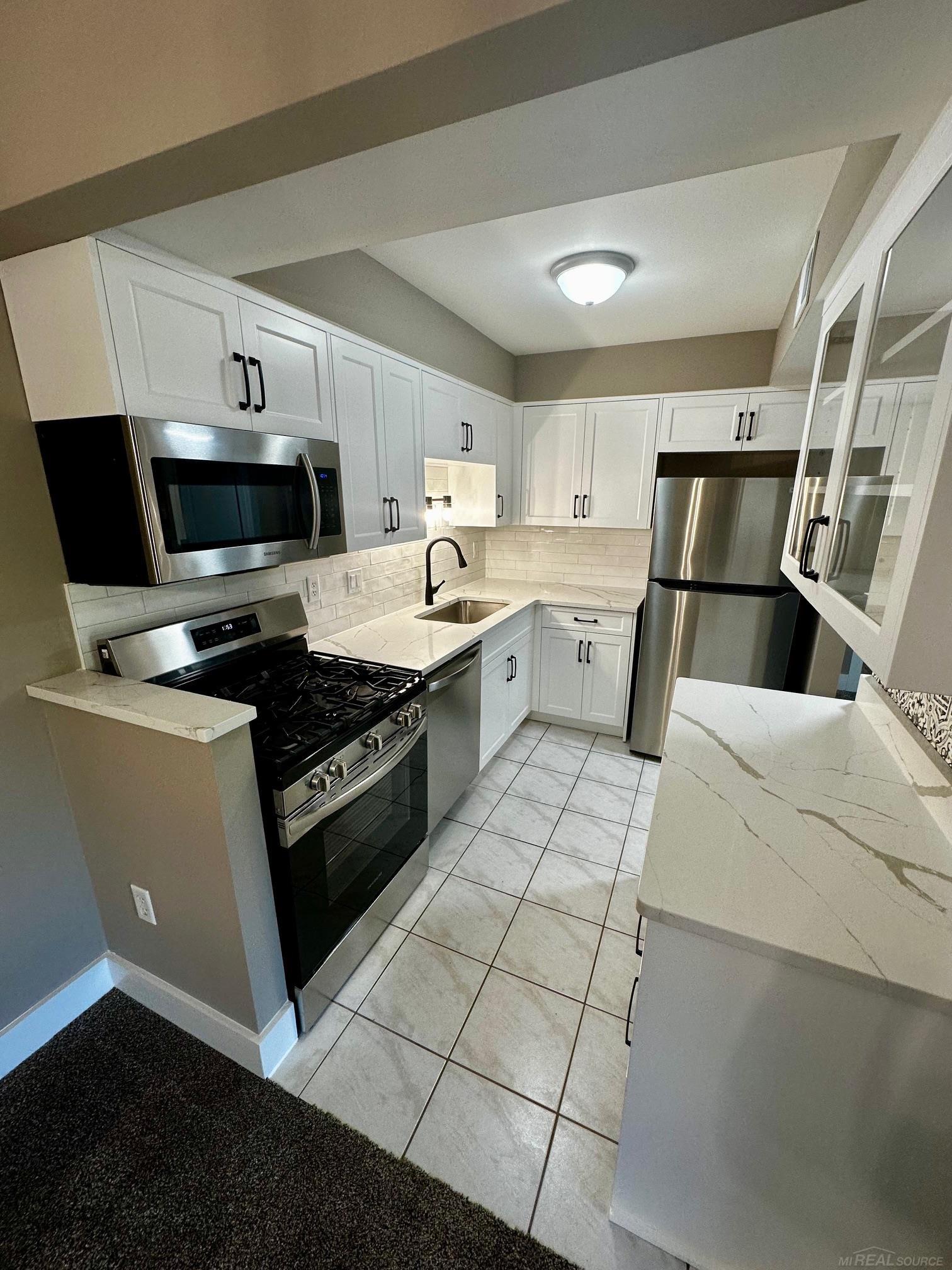 54731 Shelby Road Utica, MI 48316 - Photo 4 of 25 50193664-39423716-97ed-49d6-92e6-3c7e93c1fa80.JPG
