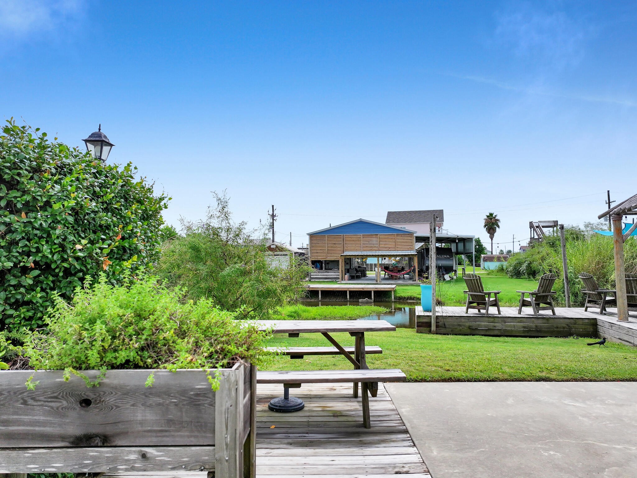 894-896 South Crystal Beach Road Crystal Beach, TX 77650 - Photo 21 of 40 a small garden in the middle of a building