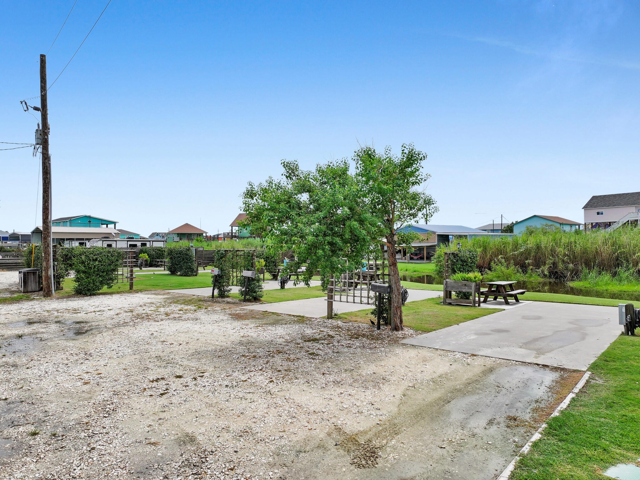 894-896 South Crystal Beach Road Crystal Beach, TX 77650 - Photo 27 of 40 a view of a park with swings