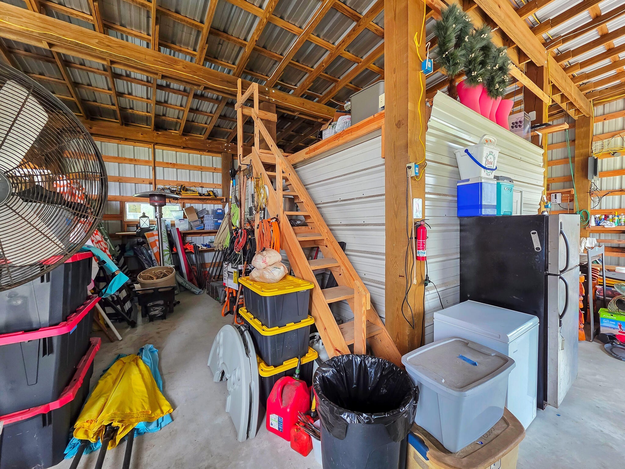 894-896 South Crystal Beach Road Crystal Beach, TX 77650 - Photo 33 of 40 a view of water heater room with wooden floor