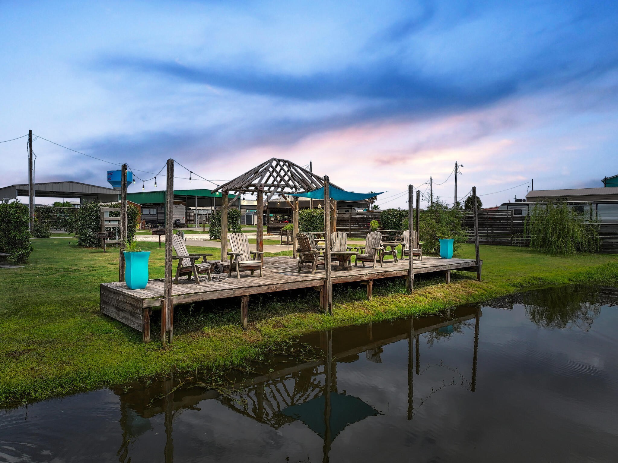 894-896 South Crystal Beach Road Crystal Beach, TX 77650 - Photo 5 of 40 a view of a lake with a house in the background