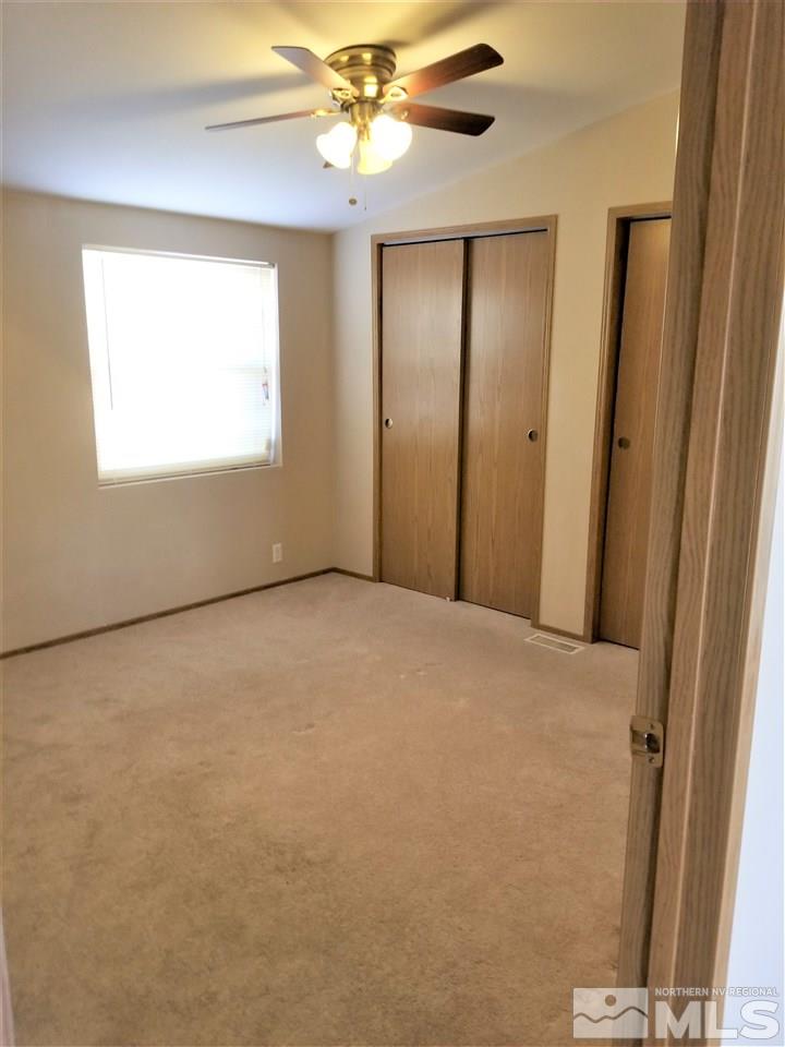 2750 Snapdragon Way Reno, NV 89512 - Photo 12 of 15 a view of an empty room with a window