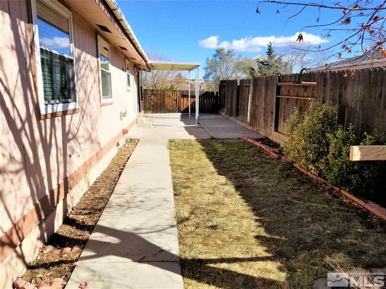 2750 Snapdragon Way Reno, NV 89512 - Photo 13 of 15 a view of a pathway with a house
