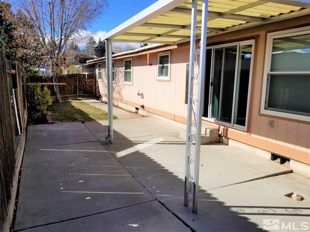 2750 Snapdragon Way Reno, NV 89512 - Photo 14 of 15 a view of a porch with a door and a door
