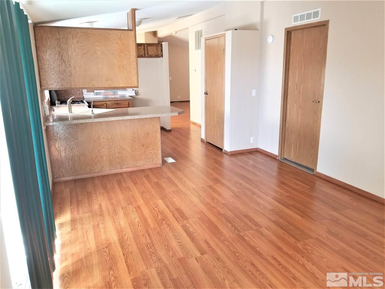 2750 Snapdragon Way Reno, NV 89512 - Photo 9 of 15 a view of a kitchen with wooden floor