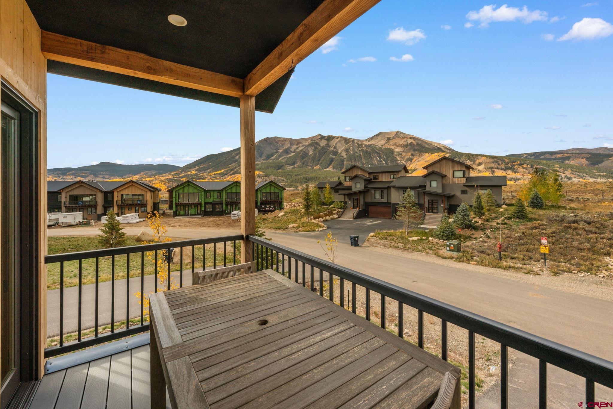 101 Elk Valley Road, Unit D Crested Butte, CO 81224 - Photo 16 of 37 a view of a city from a balcony