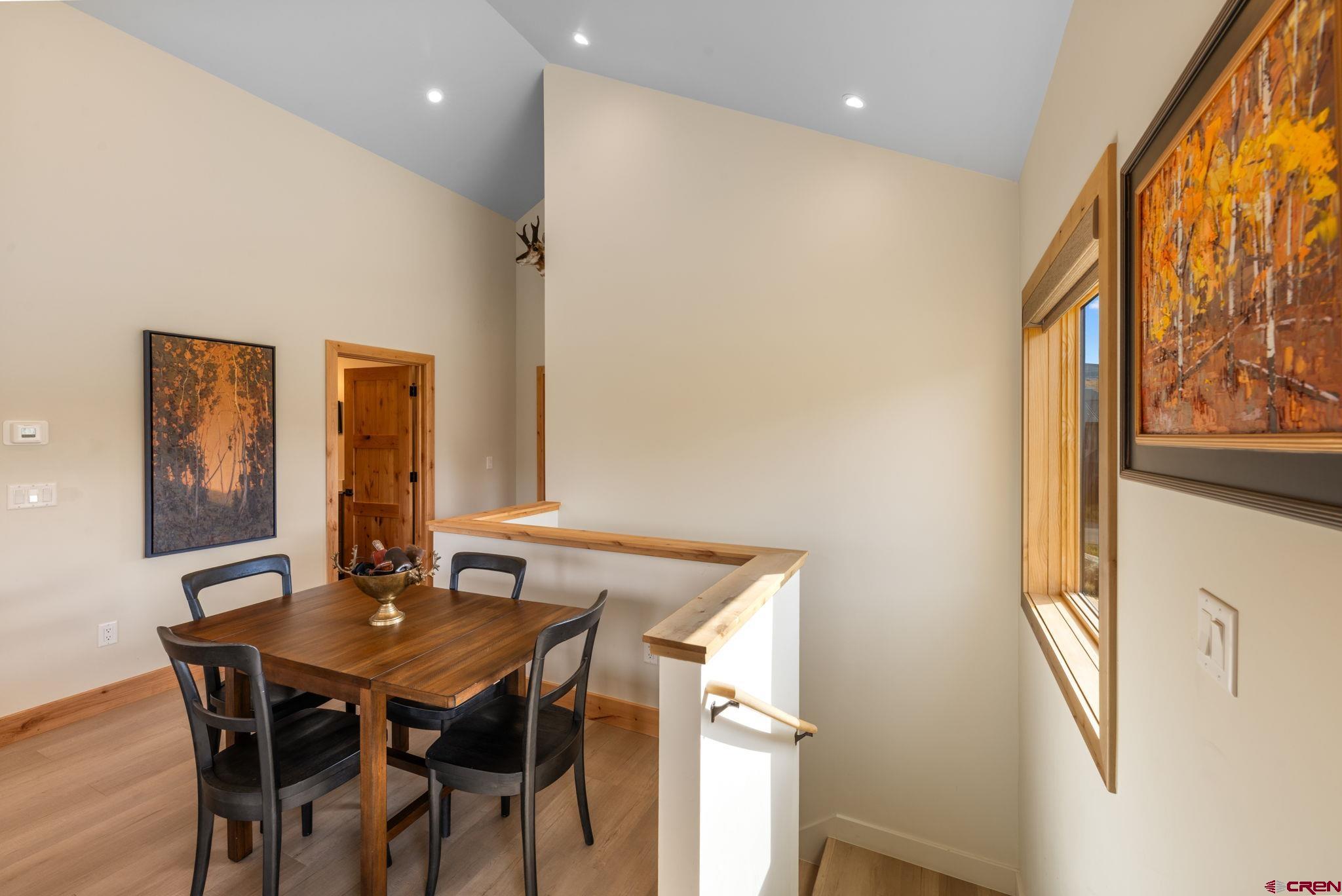 101 Elk Valley Road, Unit D Crested Butte, CO 81224 - Photo 19 of 37 a view of a dining room with furniture and window