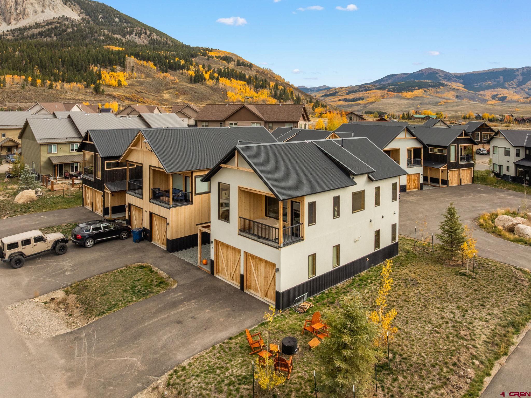 101 Elk Valley Road, Unit D Crested Butte, CO 81224 - Photo 33 of 37 an aerial view of a house with a yard