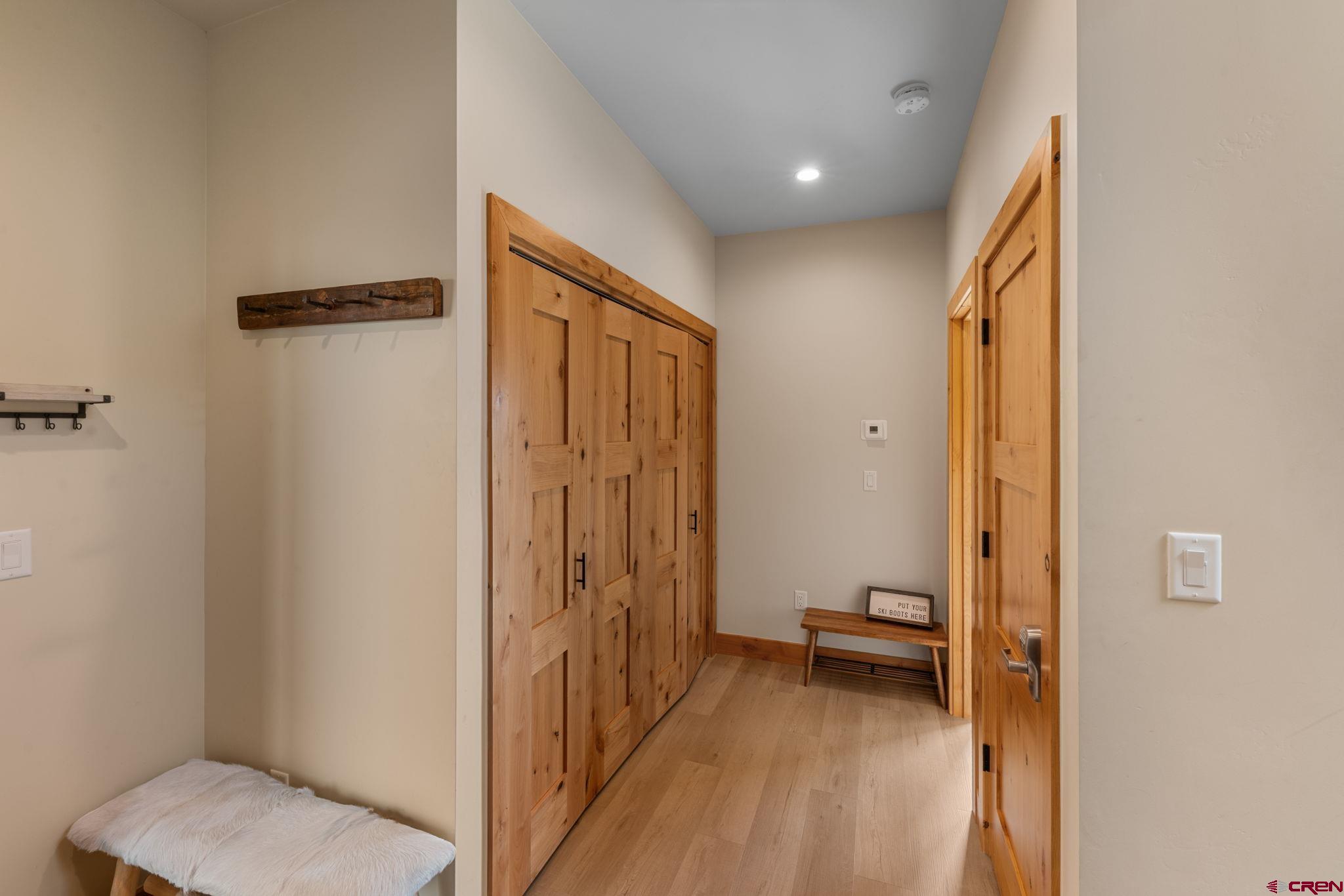 101 Elk Valley Road, Unit D Crested Butte, CO 81224 - Photo 5 of 37 a view of a hallway with bathroom and a bathroom