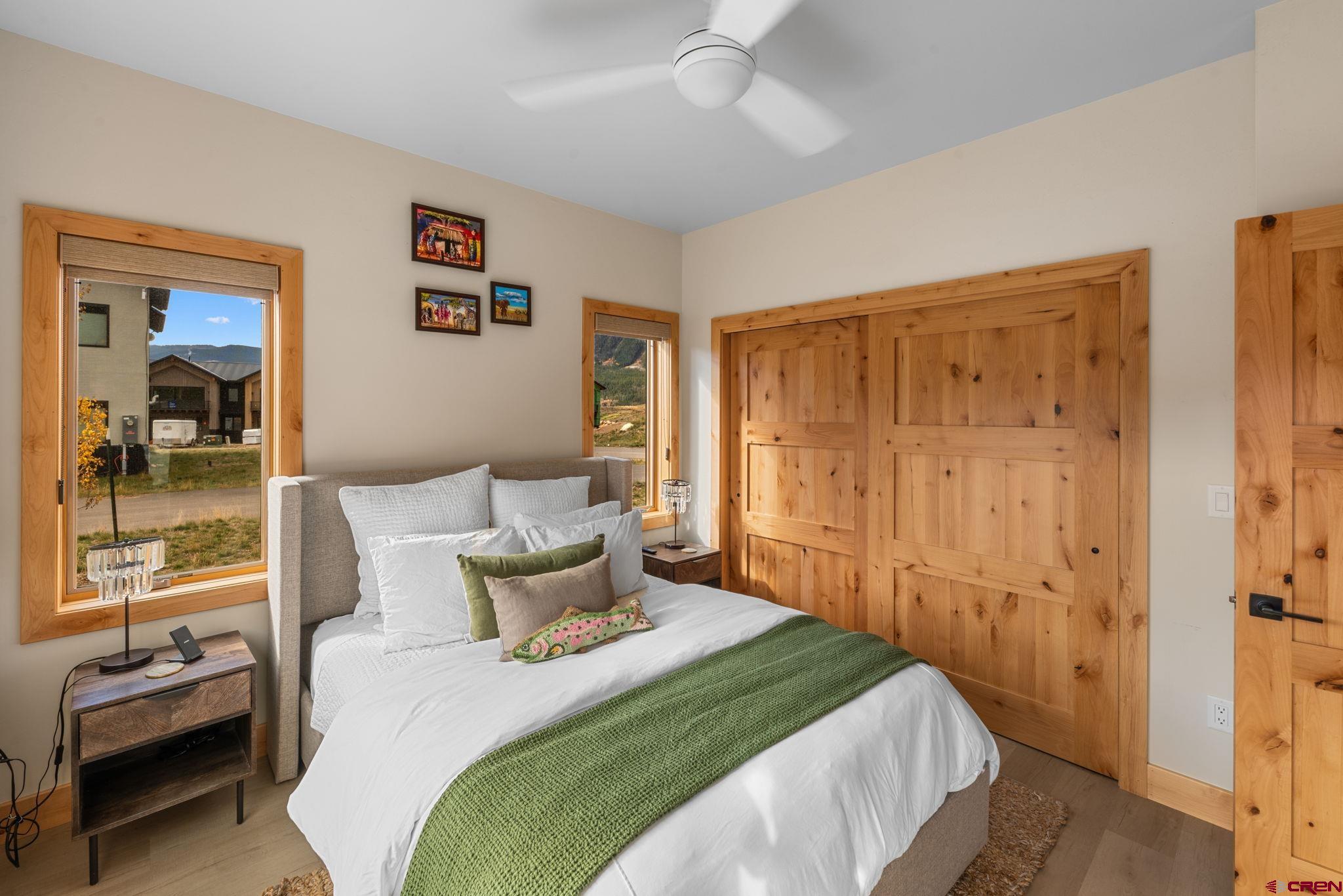 101 Elk Valley Road, Unit D Crested Butte, CO 81224 - Photo 7 of 37 a bedroom with a bed and a window