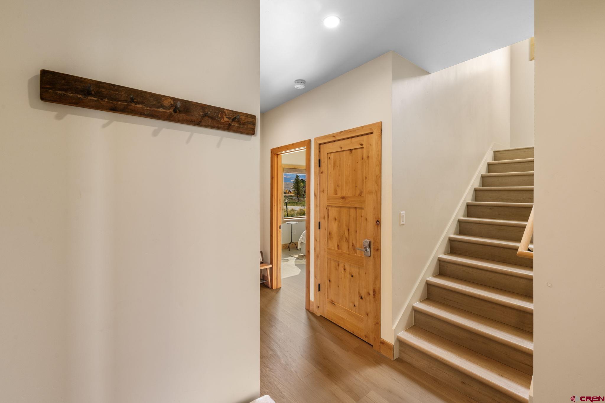 101 Elk Valley Road, Unit D Crested Butte, CO 81224 - Photo 10 of 37 a view of a hallway with wooden floor and entryway