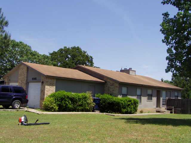 809 Lloyd Lane Elgin, TX 78621 - Photo 1 of 1 Exterior Front : front view mixed among homes,