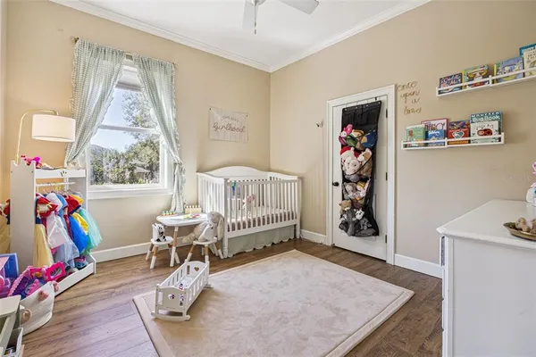 a bedroom with furniture and a window