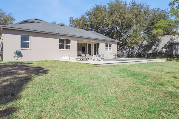 a front view of house with yard and seating area