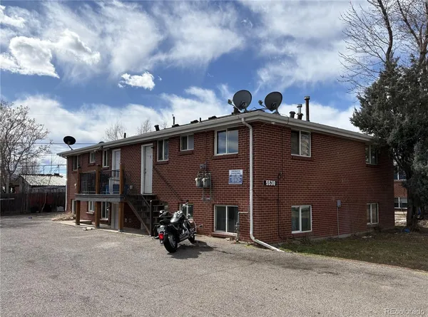 a front view of a house with patio