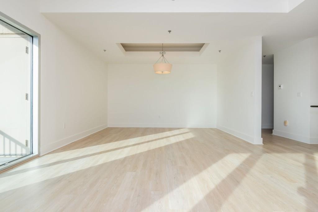4561 Olde Perimeter Way, Unit 1701 Atlanta, GA 30346 - Photo 17 of 64 a view of a room with an empty space