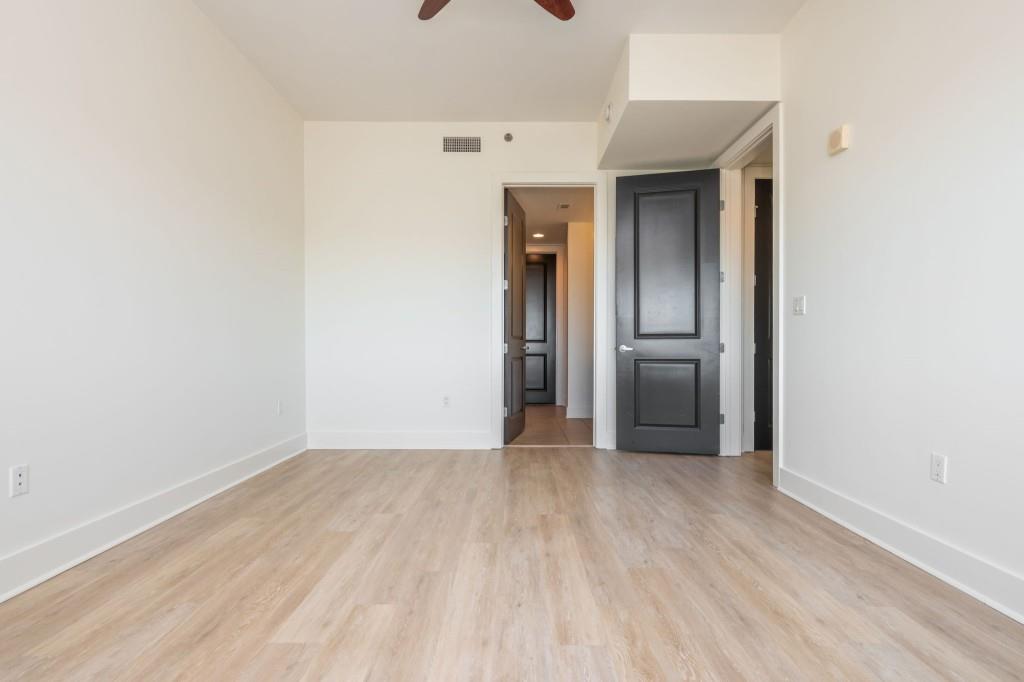 4561 Olde Perimeter Way, Unit 1701 Atlanta, GA 30346 - Photo 24 of 64 a view of a livingroom with wooden floor