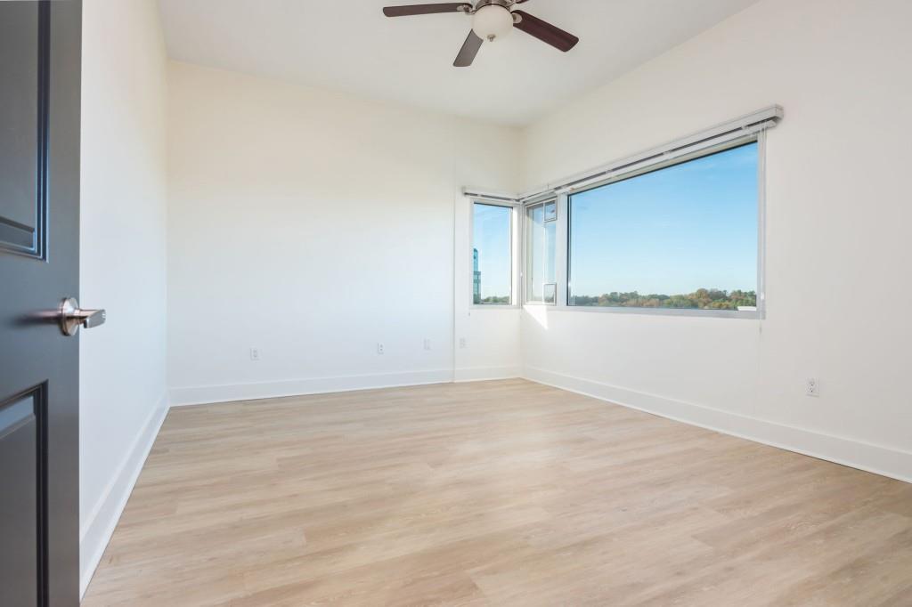 4561 Olde Perimeter Way, Unit 1701 Atlanta, GA 30346 - Photo 30 of 64 a view of an empty room with a window