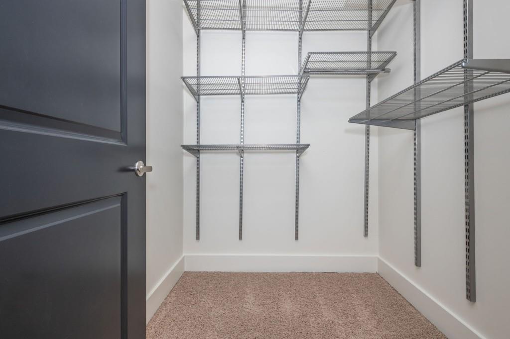 4561 Olde Perimeter Way, Unit 1701 Atlanta, GA 30346 - Photo 33 of 64 a view of small space with racks on the wall