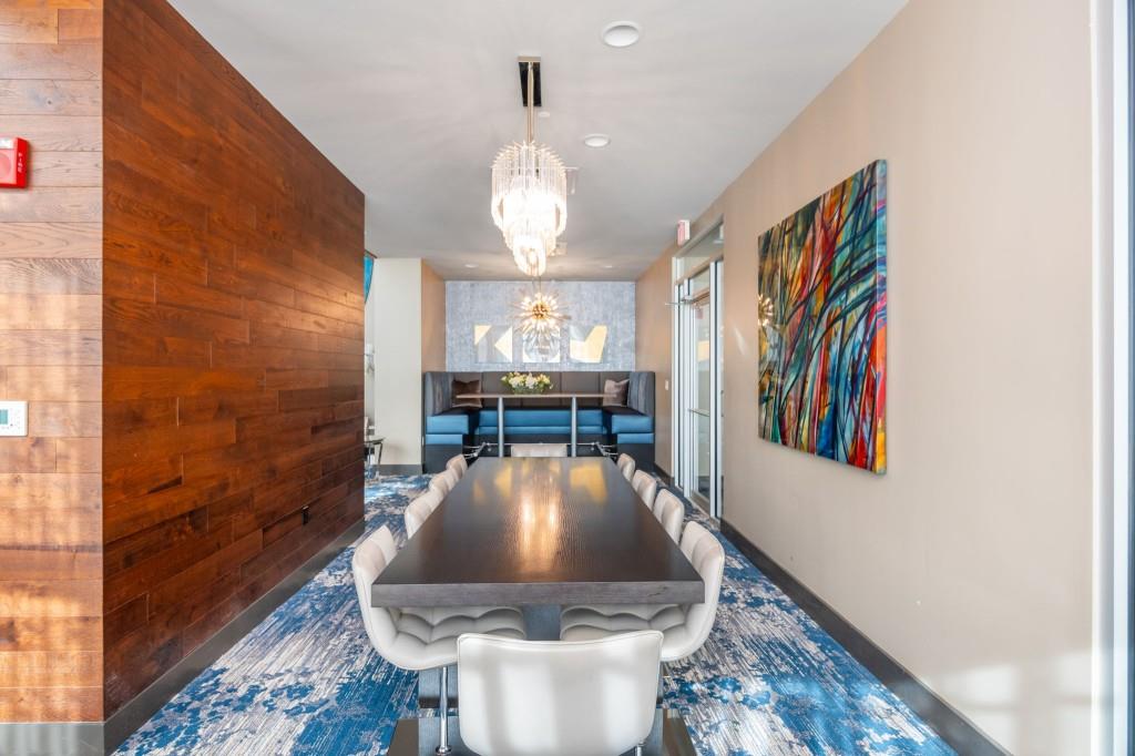 4561 Olde Perimeter Way, Unit 1701 Atlanta, GA 30346 - Photo 37 of 64 a very nice looking dining room with a large window