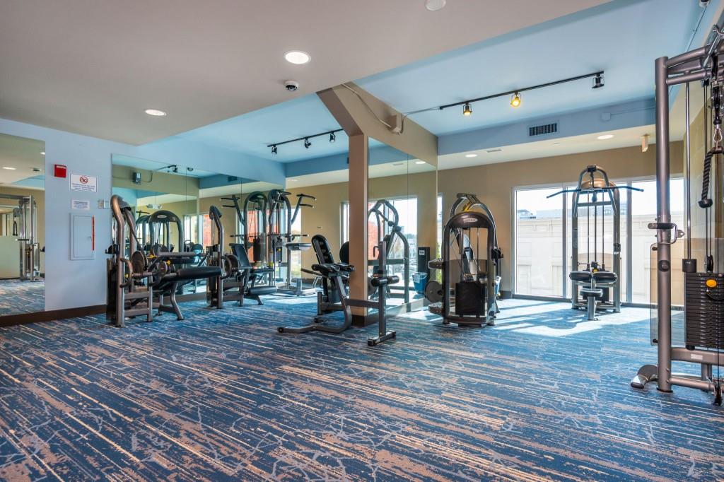 4561 Olde Perimeter Way, Unit 1701 Atlanta, GA 30346 - Photo 45 of 64 a view of a room with gym equipment
