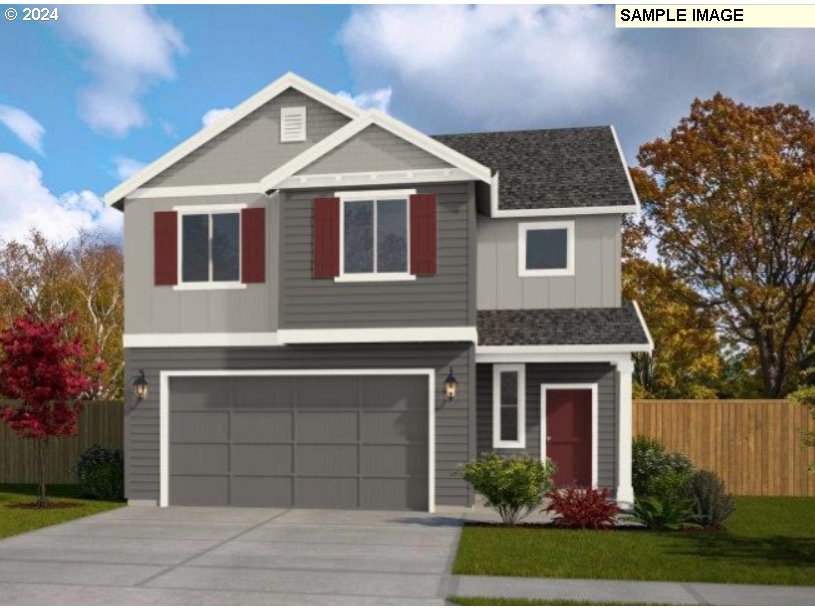 200 South 87th Avenue Ridgefield, WA 98642 - Photo 1 of 16 a front view of a house with garden